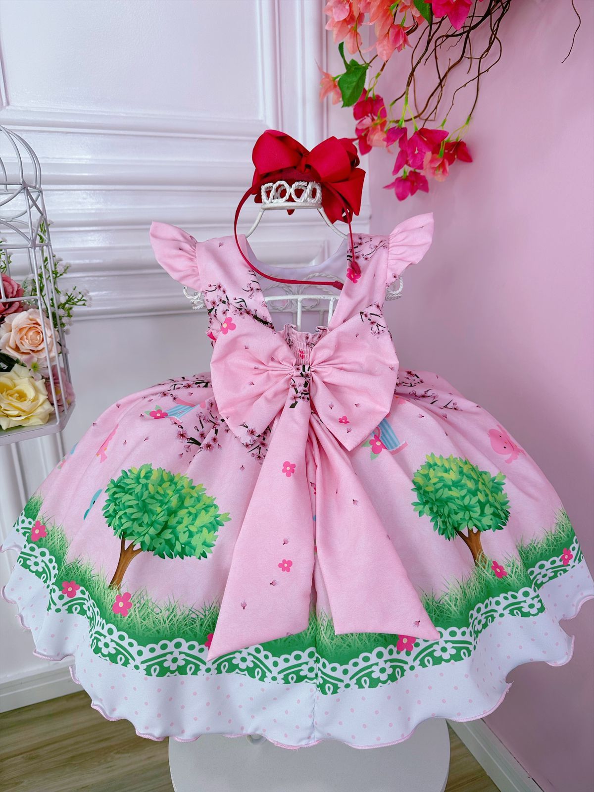 Vestido infantil rosa con cinturón de perlas de Jardín Encantado