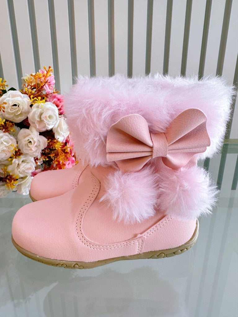 Botitas infantiles rosas con lazo de pompón, peluche y cremallera