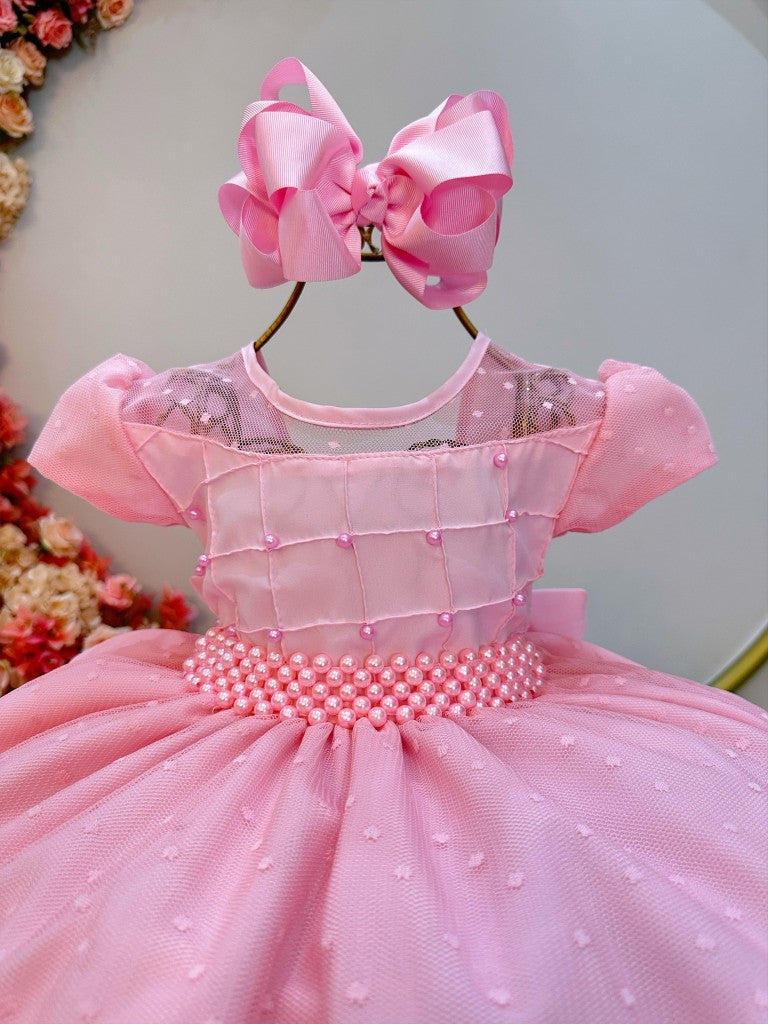 Vestido infantil rosa claro con busto acanalado y tul palomitas