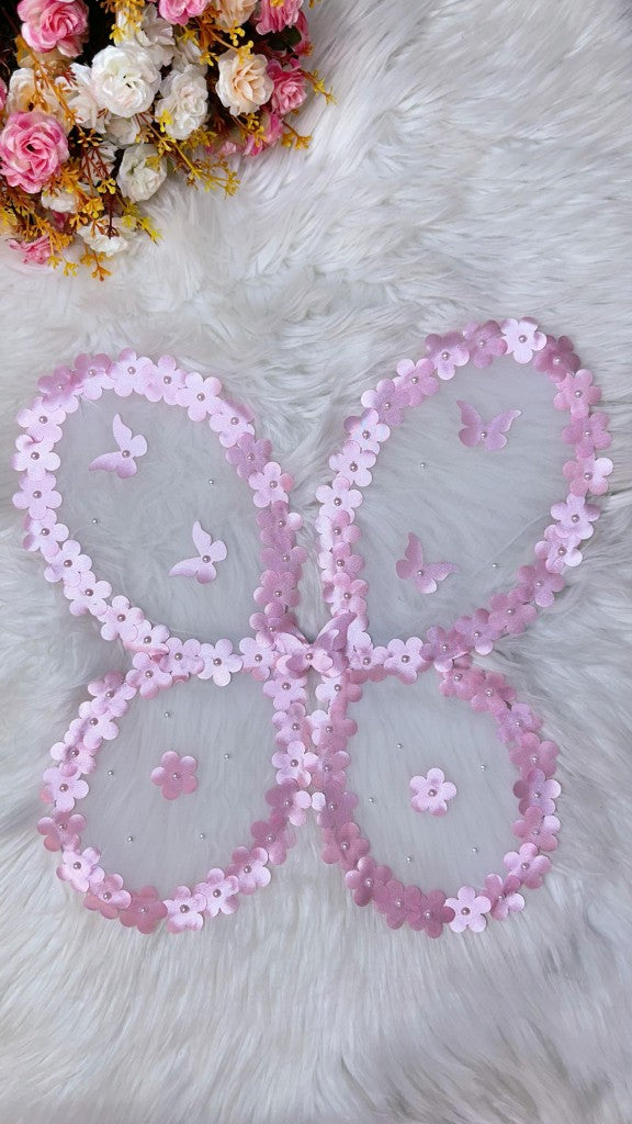 Hada rosa del jardín encantado con alas de mariposa