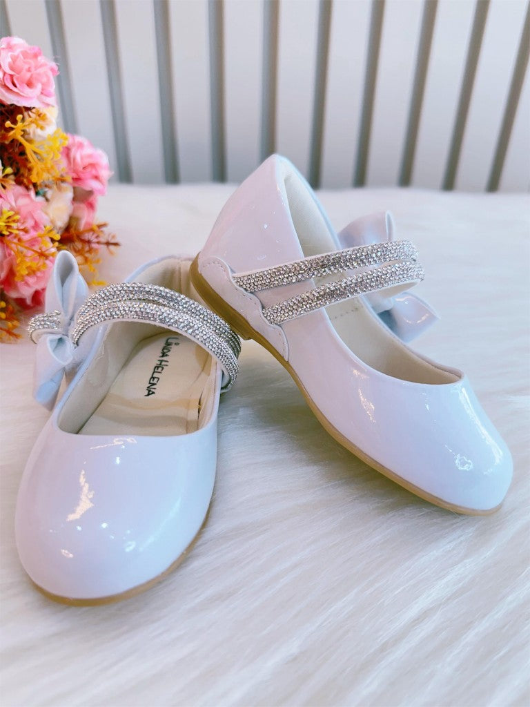 Zapato de charol blanco con lazo y tiras de pedrería