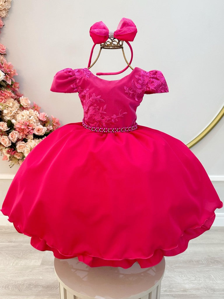 Vestido infantil rosa con tiara de encaje y cinturón de perlas