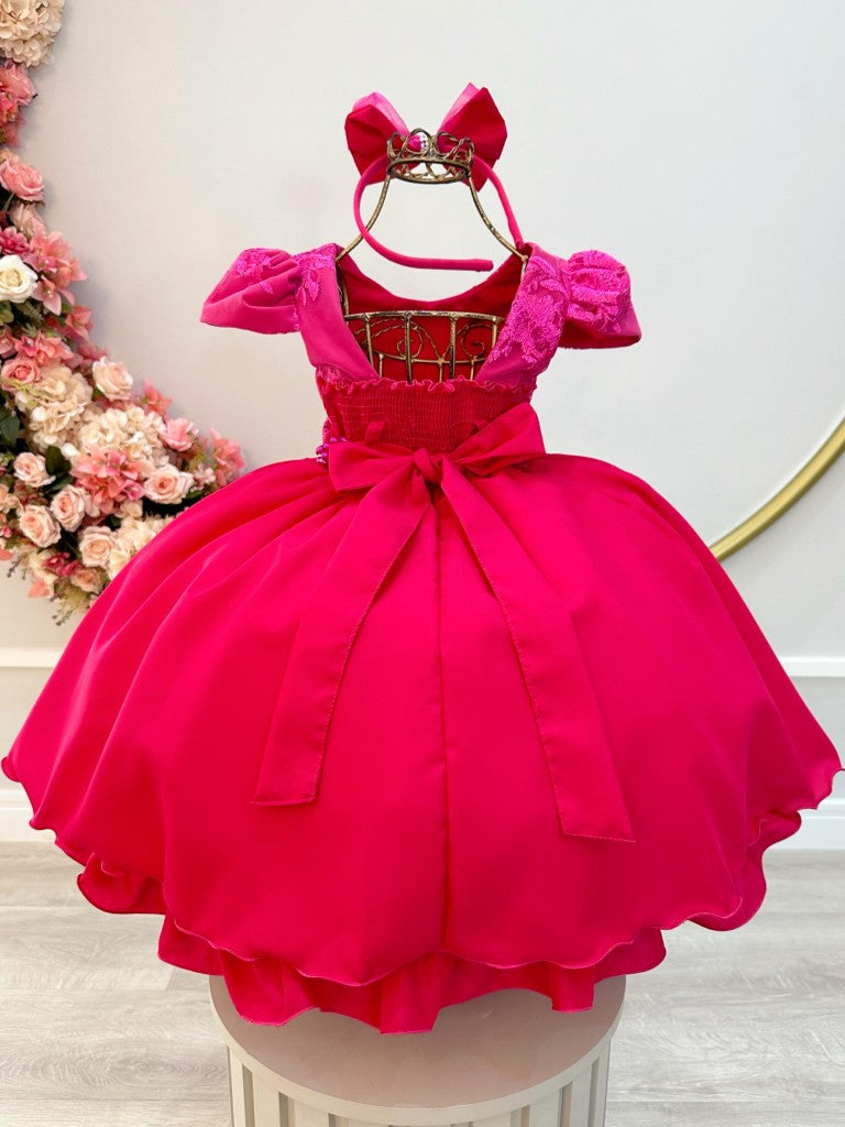 Vestido infantil rosa con tiara de encaje y cinturón de perlas