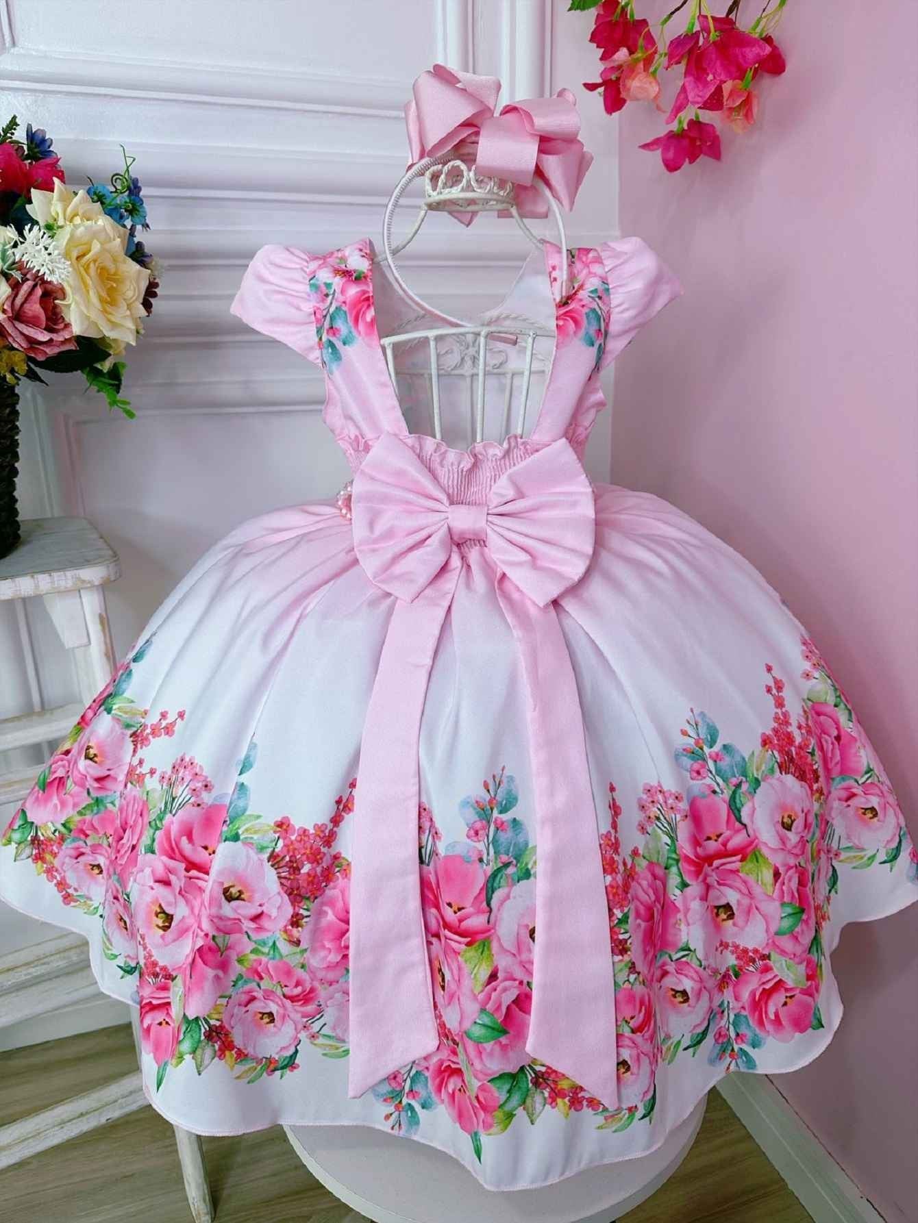 Vestido floral rosa bebé con cinturón de perlas de lujo