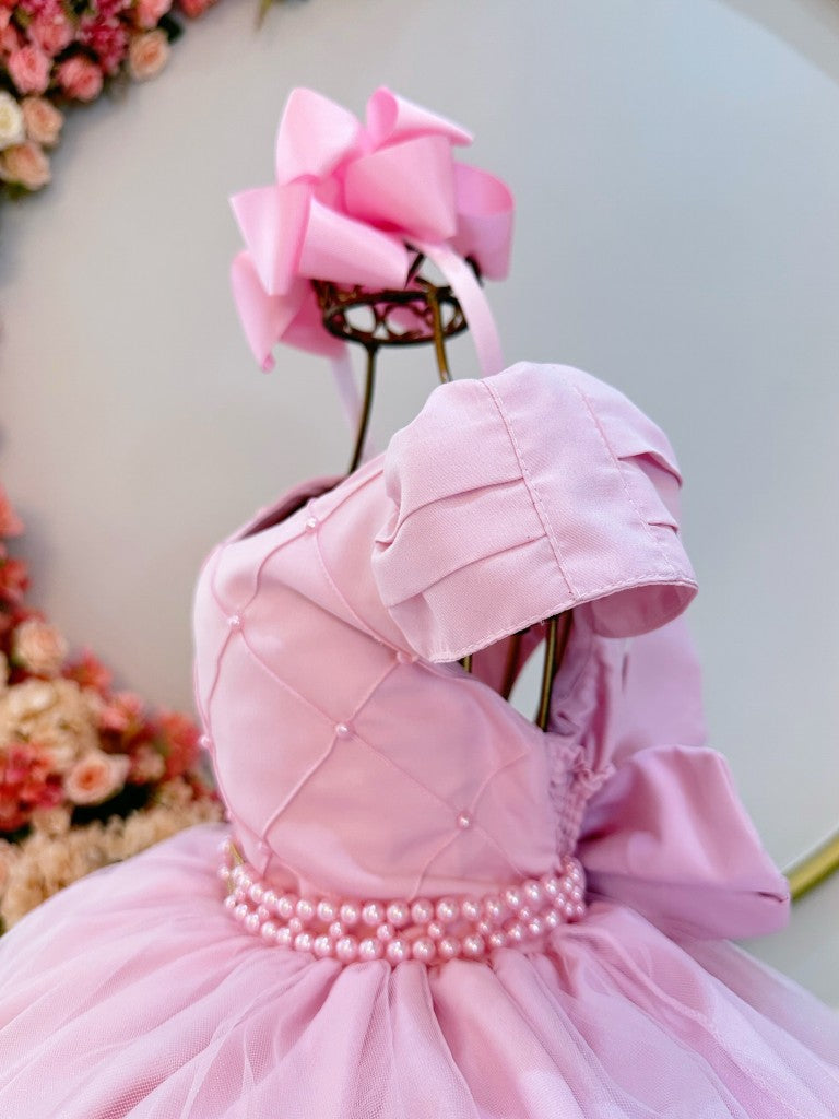 Vestido infantil rosa claro con busto acanalado para fiestas de damas