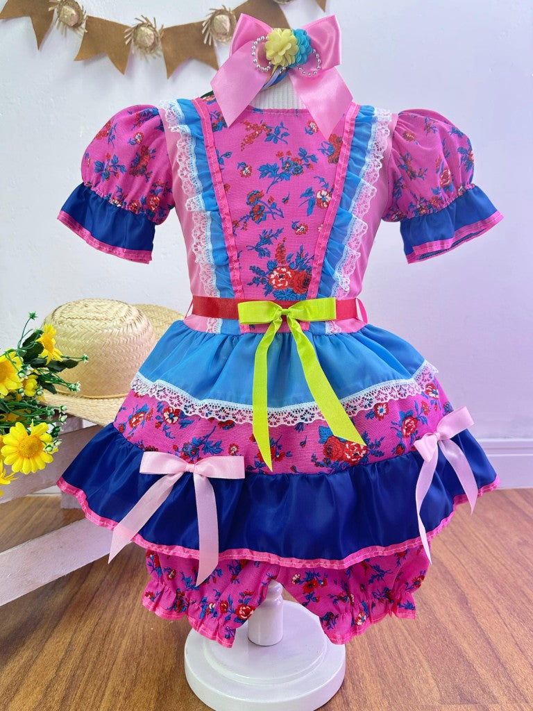 Disfraz infantil de junio con flores de colores rosa y azul