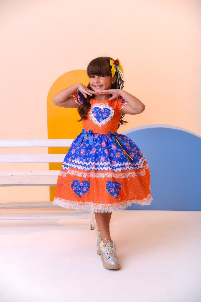 Vestido infantil naranja colorido para fiesta de junio