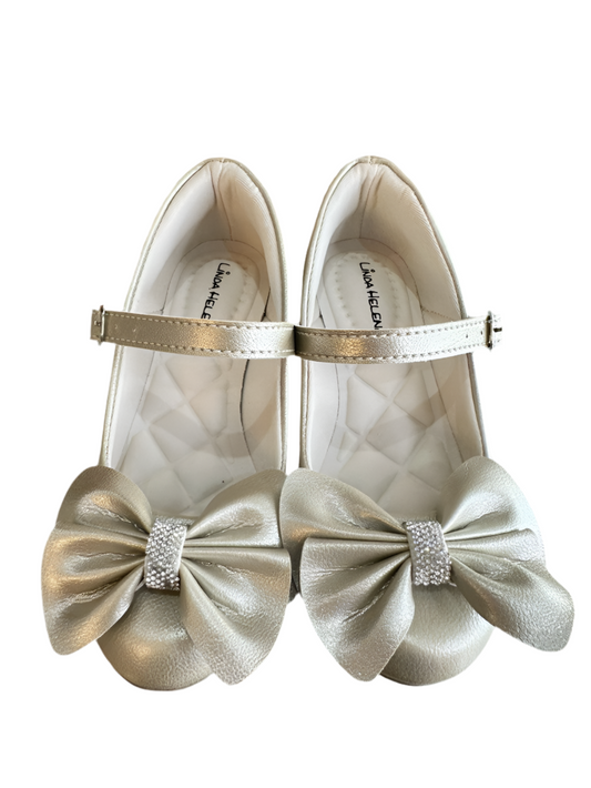 Zapato de tacón dorado mate con lazo y aplique de diamantes de imitación