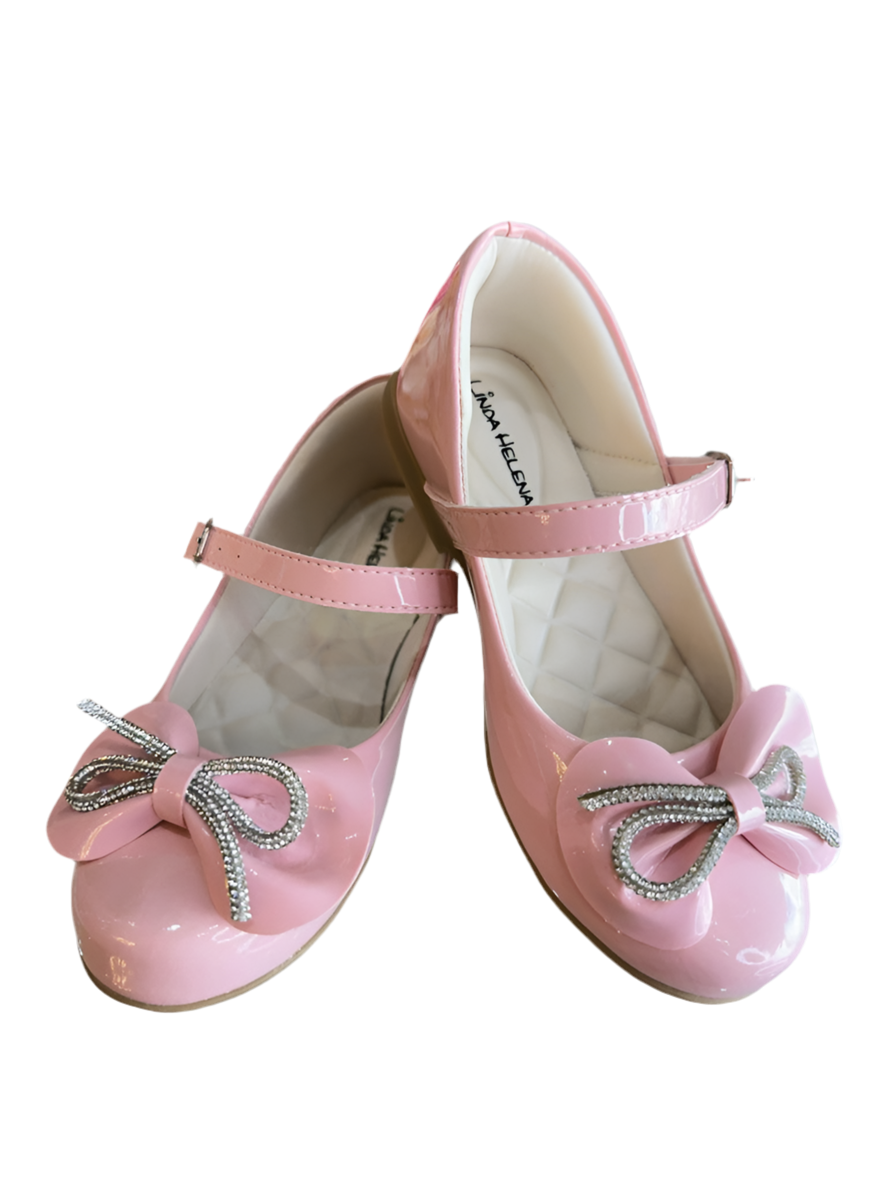 Zapatos infantiles de charol rosa con lazo y aplique de pedrería 