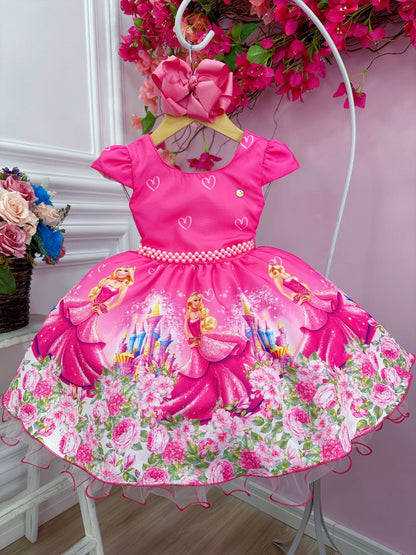 Vestido rosa chicle de Barbie con cinturón de perlas