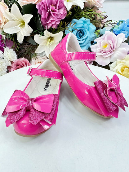 Zapatos de charol rosa de súper lujo con lazo y purpurina