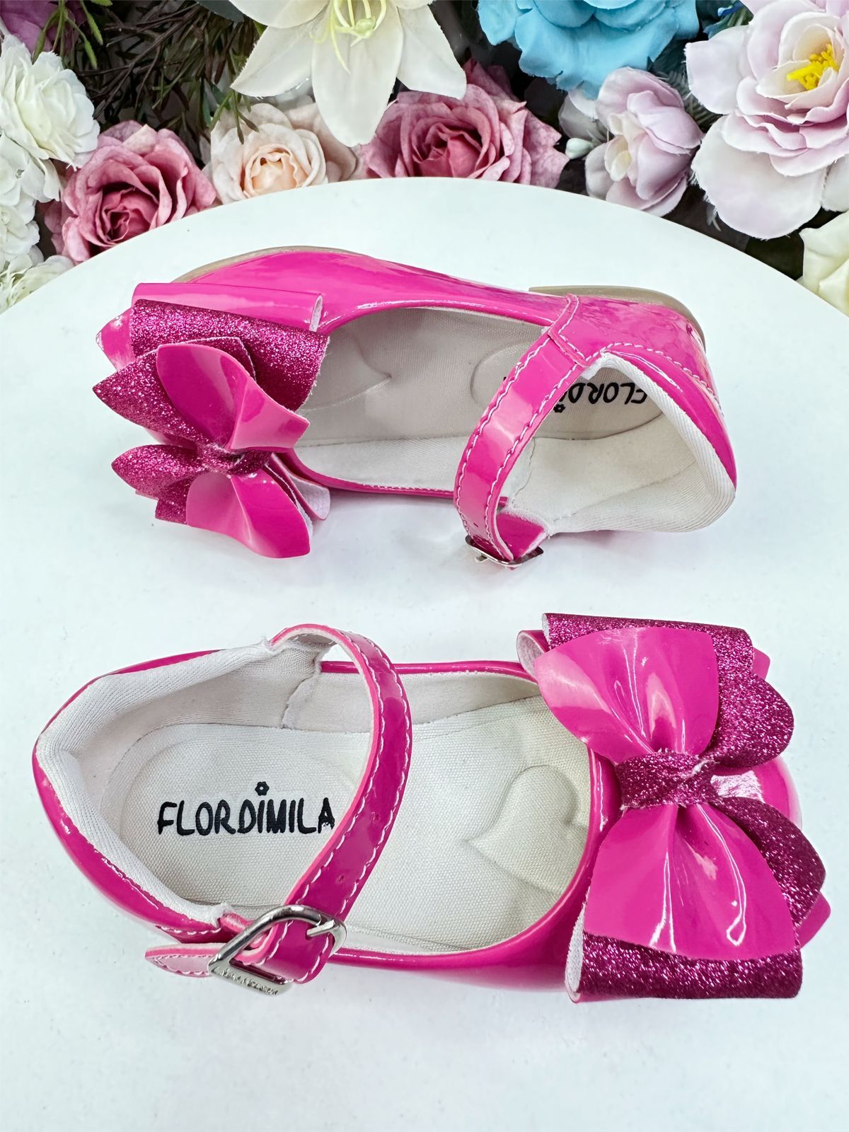 Zapatos de charol rosa de súper lujo con lazo y purpurina