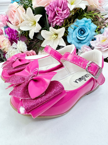 Zapatos de charol rosa de súper lujo con lazo y purpurina