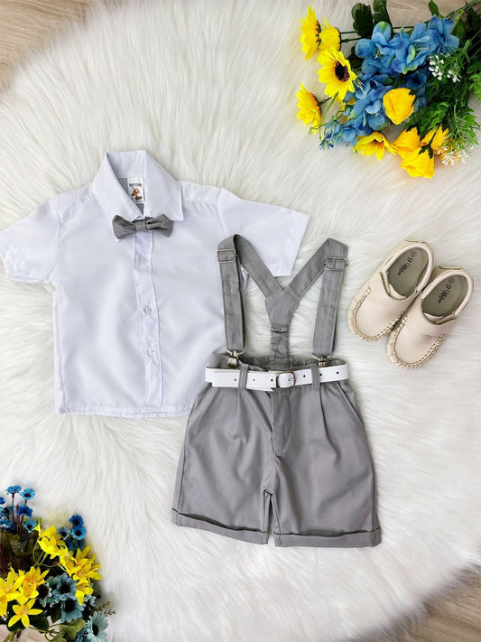 Conjunto formal con short con tirantes, corbata gris y camisa blanca