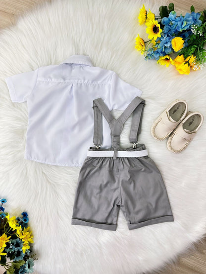 Conjunto formal con short con tirantes, corbata gris y camisa blanca
