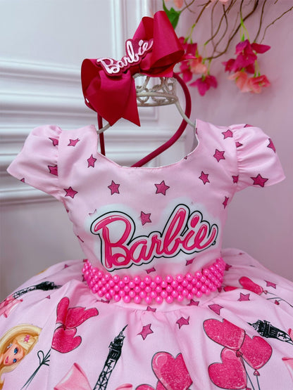 Vestido rosa y cinturón de perlas rosa de Barbie París