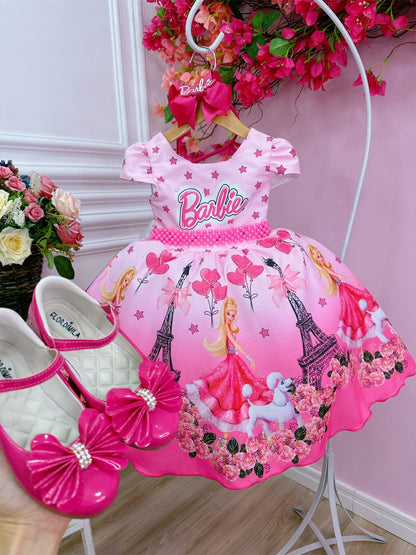 Vestido rosa y cinturón de perlas rosa de Barbie París