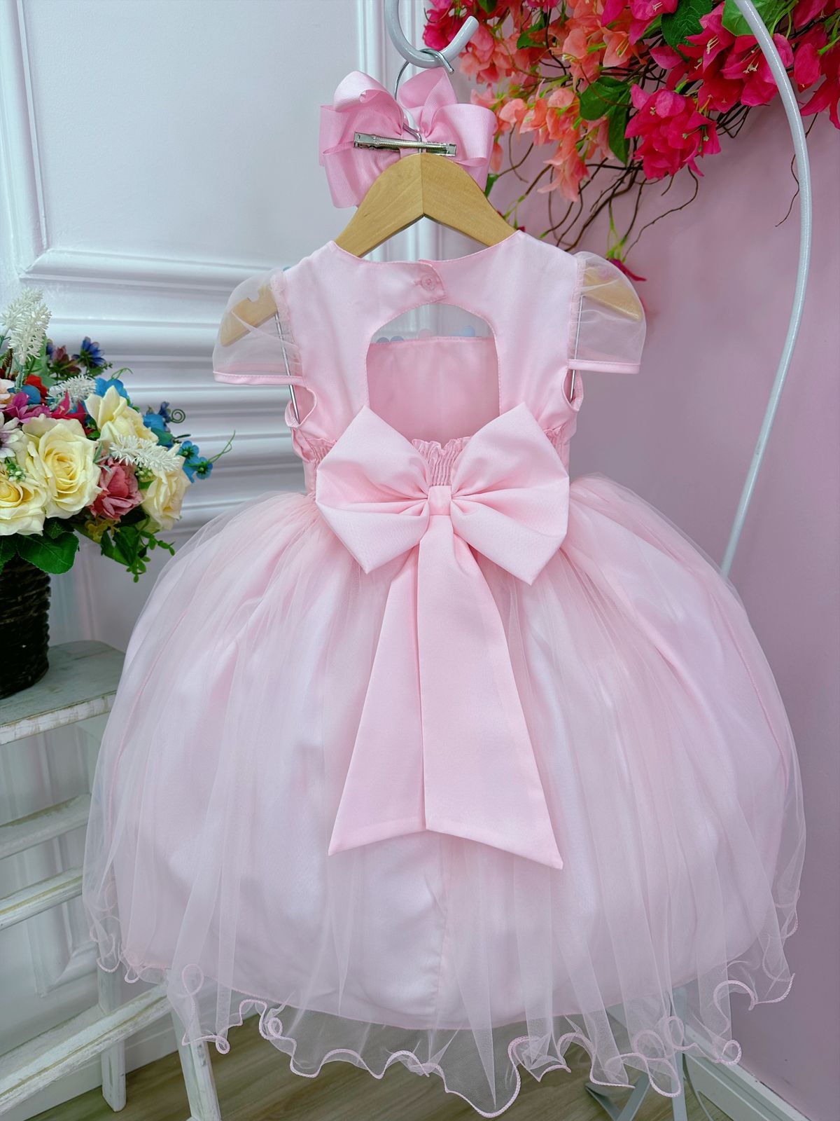 Vestido infantil rosa con apliques de flores de mariposa plisadas
