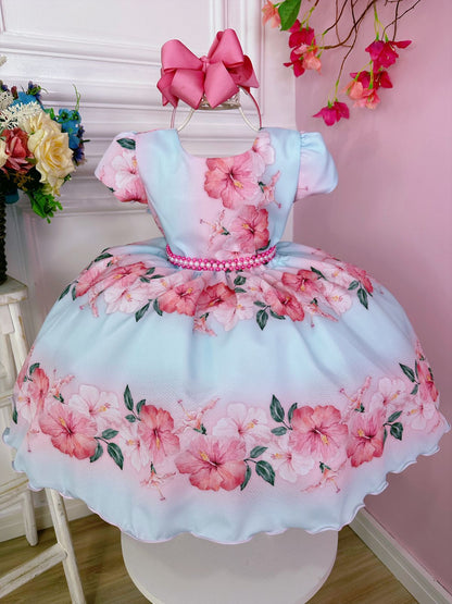 Vestido floral de primavera en azul bebé con cinturón de perlas