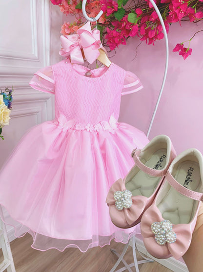 Vestido infantil rosa con flores, mariposas y apliques de encaje