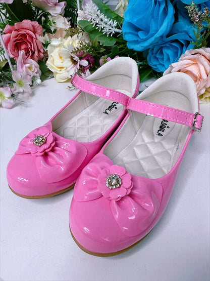Zapatos de charol rosa chicle con lazo y flor de diamantes de imitación 