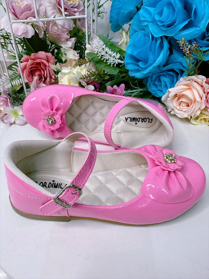 Zapatos de charol rosa chicle con lazo y flor de diamantes de imitación 