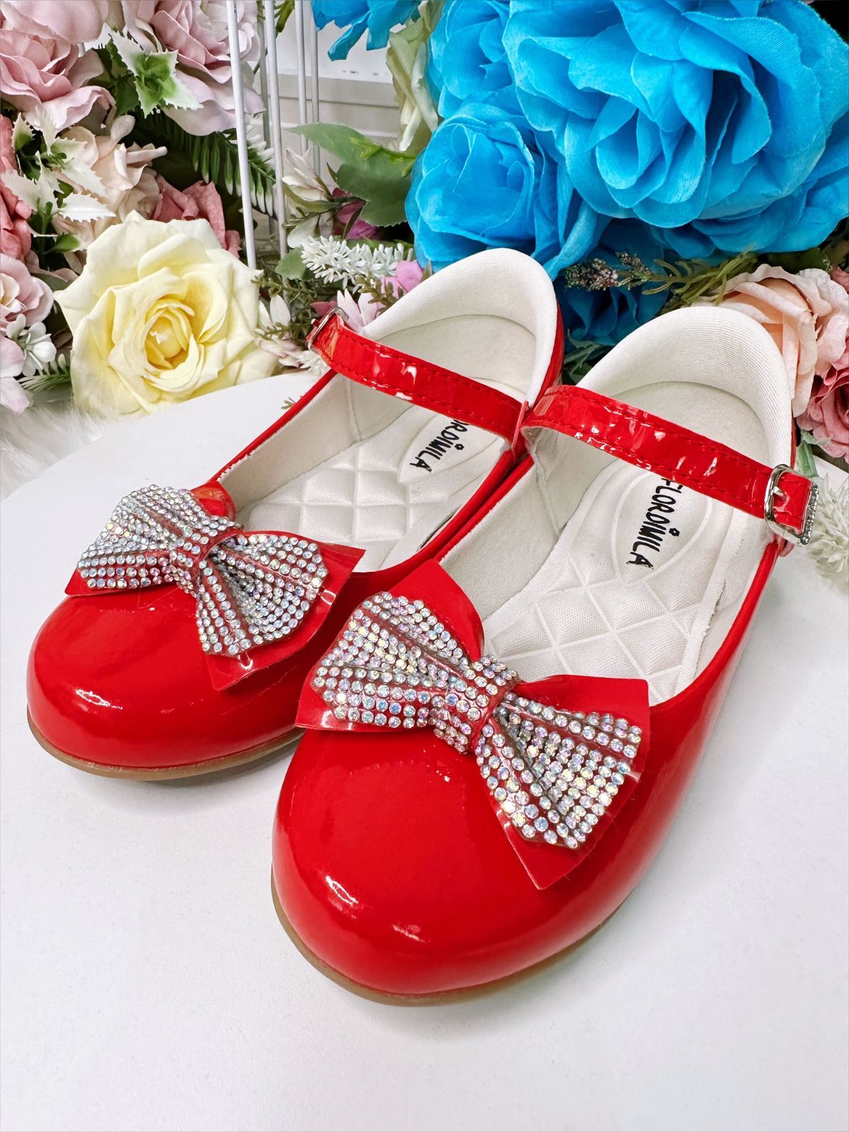 Zapato de charol rojo con lazo de diamantes de imitación de lujo 