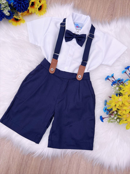 Conjunto formal: camisa blanca, corbata, pantalones cortos, tirantes azules 