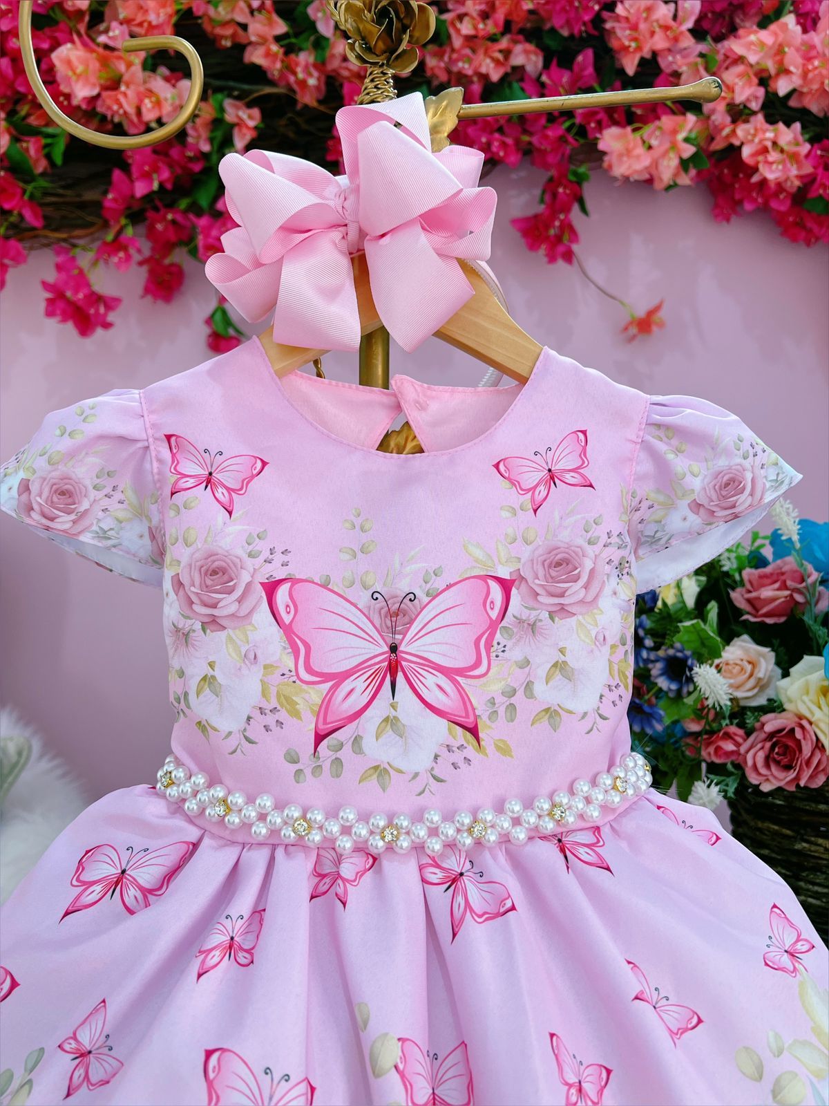 Vestido infantil de mariposas rosas con pedrería y perlas