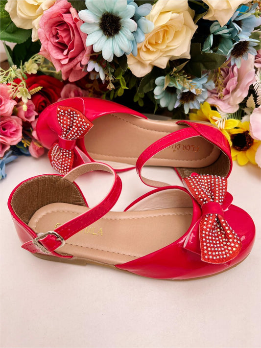 Zapatos de charol rojo con lazo y pedrería de lujo 