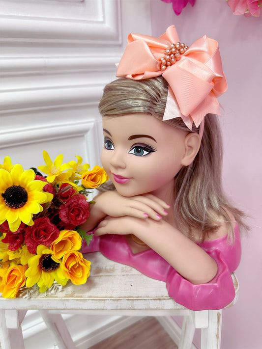 Tiara infantil con nudo Maxx de salmón y perlas de lujo
