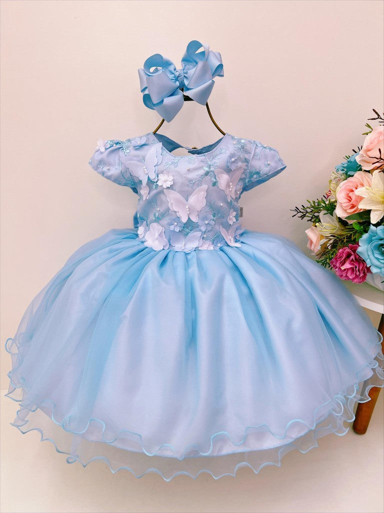 Vestido infantil azul con mariposas y flores en encaje de lujo