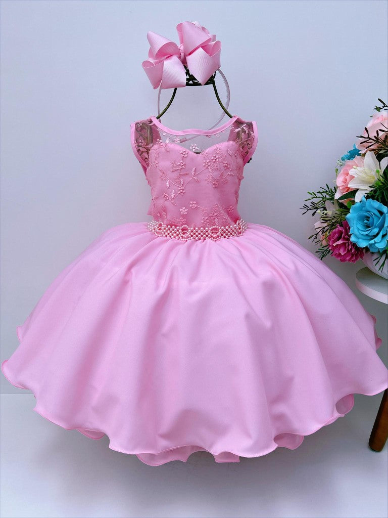 Vestido infantil rosa chicle con encaje y cinturón de perlas