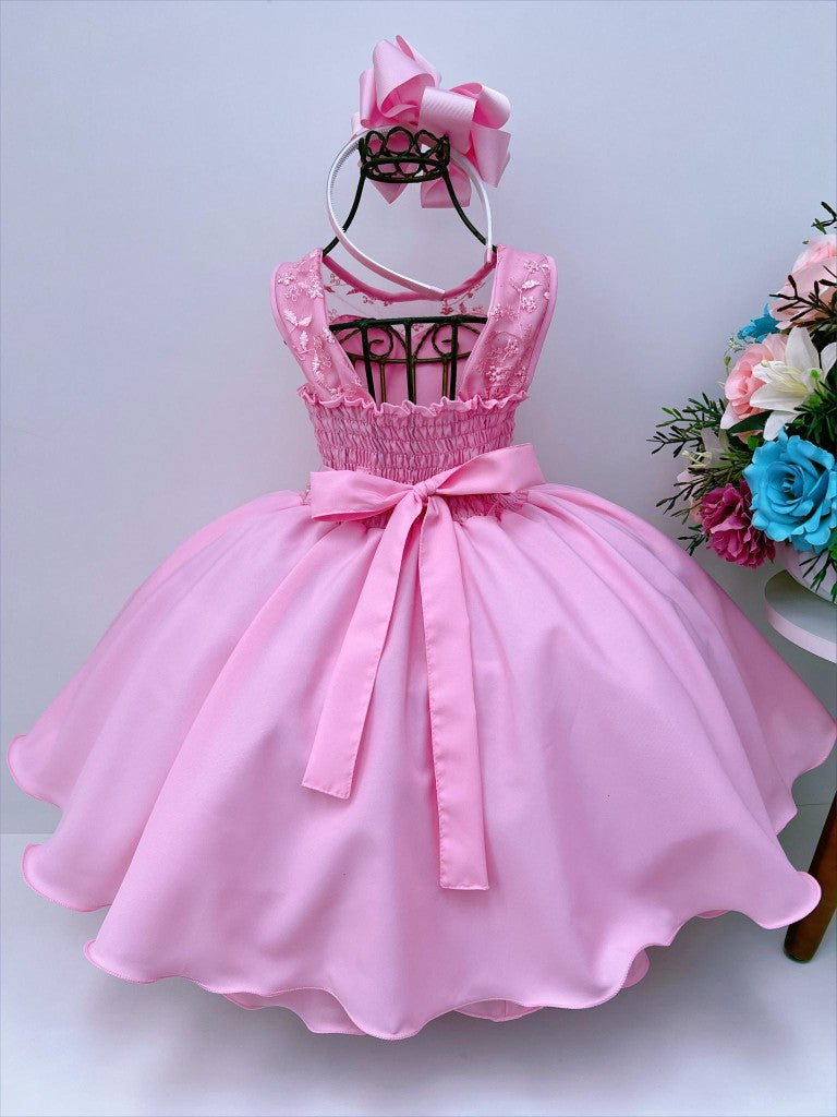Vestido infantil rosa chicle con encaje y cinturón de perlas
