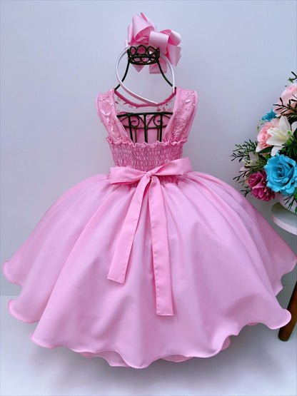 Vestido infantil rosa chicle con encaje y cinturón de perlas