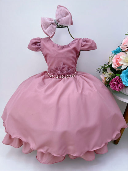 Vestido infantil de encaje rosa con cinturón de perlas y lazo