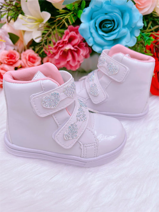 Botines infantiles de charol blanco con corazón brillante y velcro