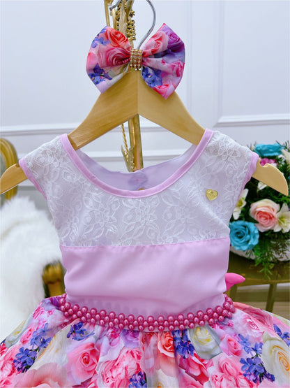 Vestido infantil con estampado floral rosa, lazo y cinturón de perlas de lujo