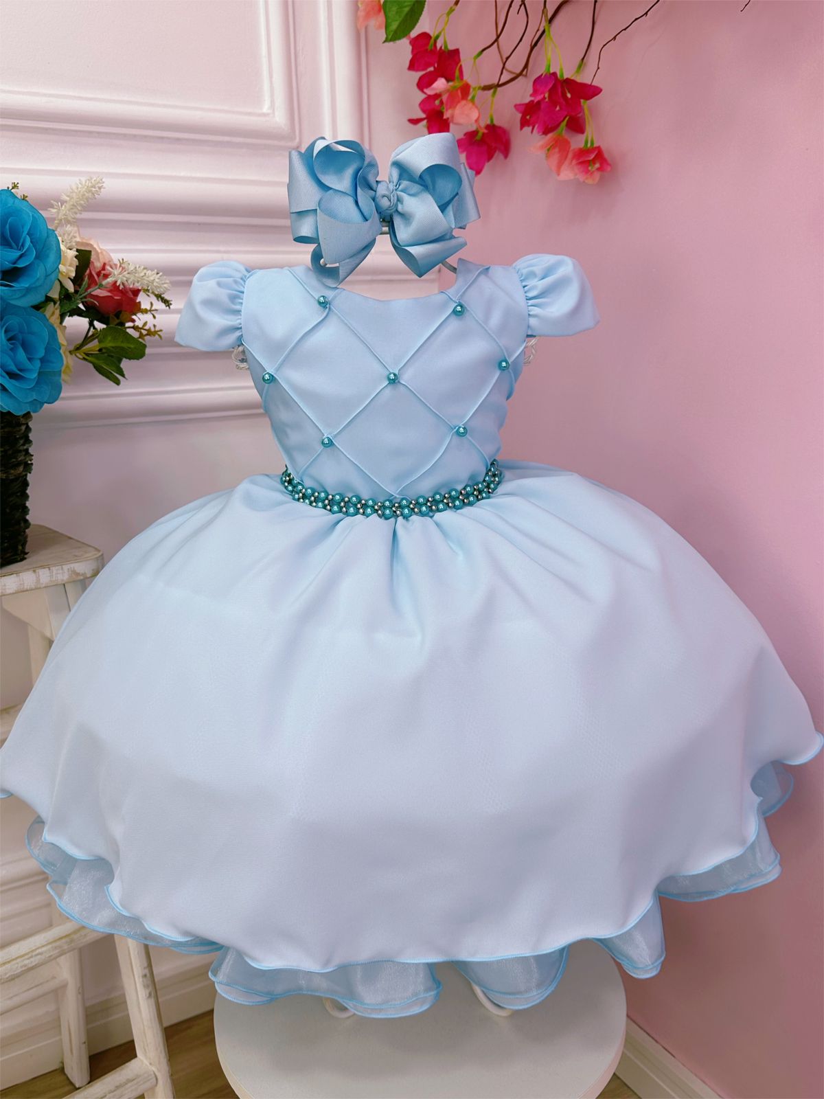 Vestido infantil azul bebé con pecho acanalado y cinturón de perlas