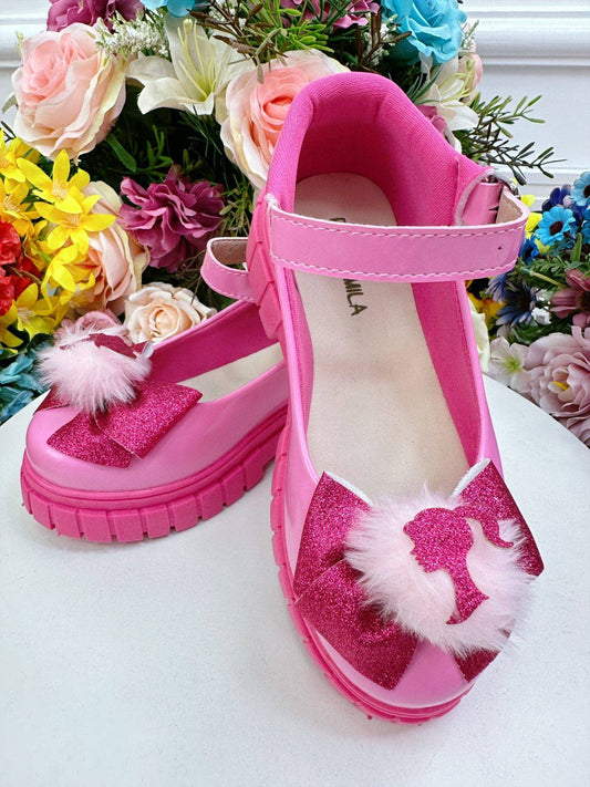 Zapato de tacón tractor con lazo rosa y chicle rosa de Barbie