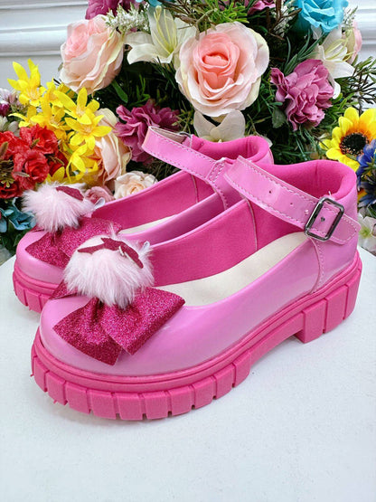 Zapato de tacón tractor con lazo rosa y chicle rosa de Barbie