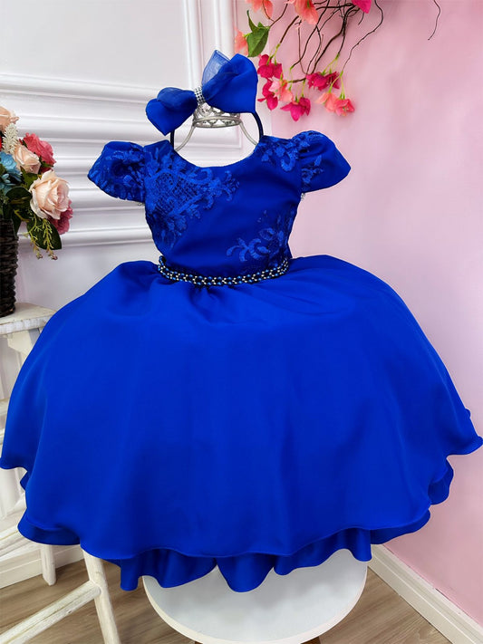 Vestido infantil de encaje azul real con cinturón de perlas y tiara