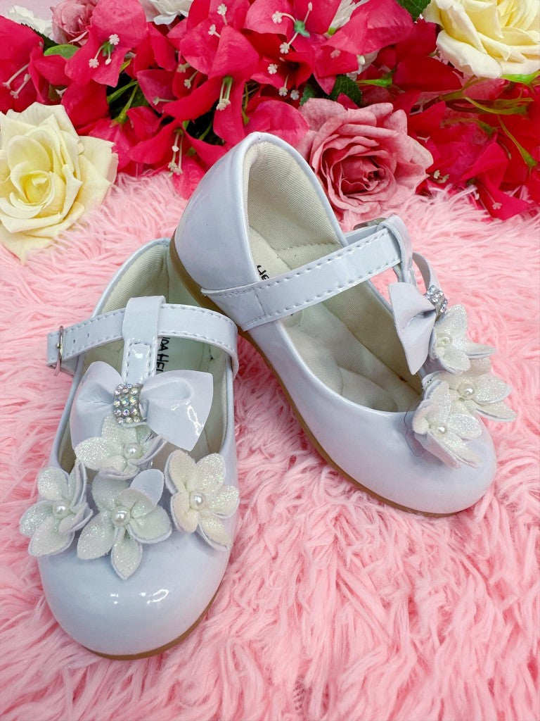 Zapatos de charol blanco con aplique de flores y lazo de lujo 