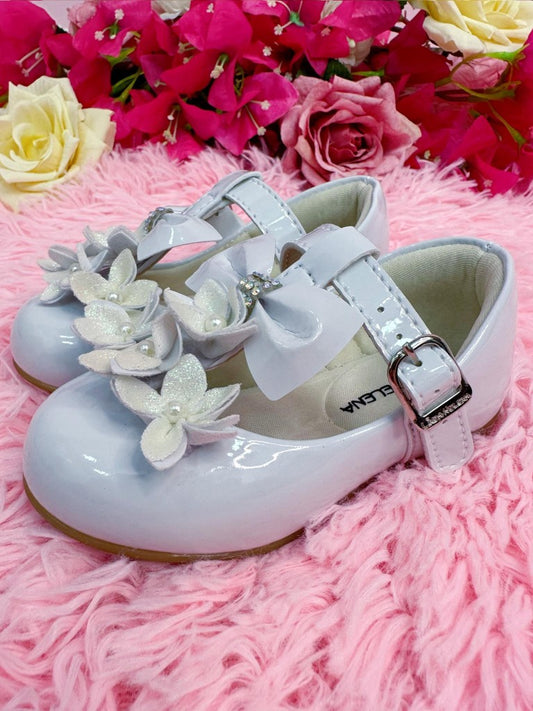 Zapatos de charol blanco con aplique de flores y lazo de lujo 