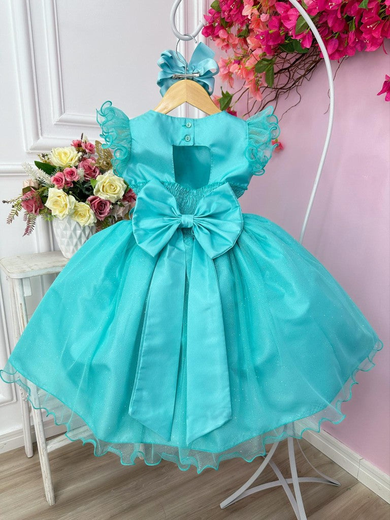 Vestido infantil verde con purpurina y broche de flores de lujo