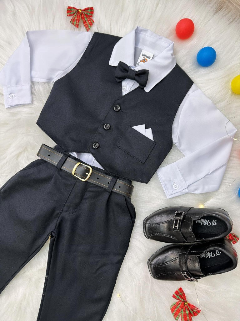 Conjunto formal: Camisa y chaleco blancos, pantalones, corbata negra.