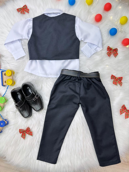 Conjunto formal: Camisa y chaleco blancos, pantalones, corbata negra.