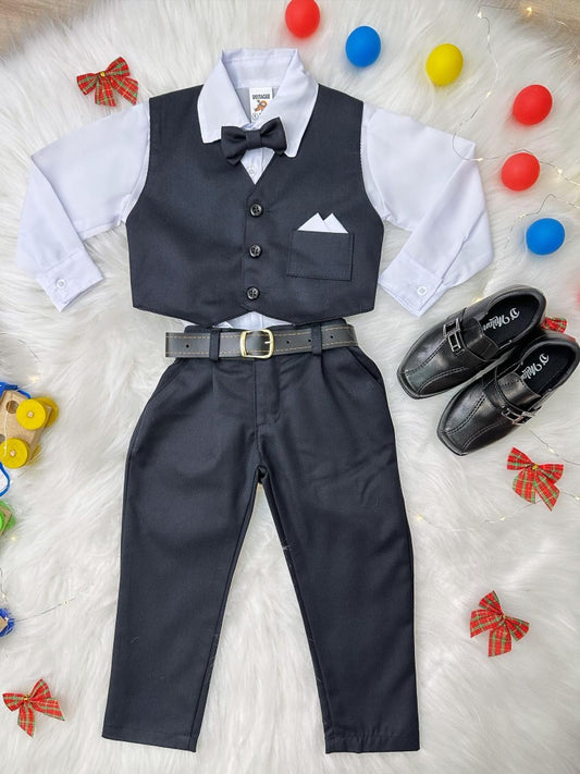 Conjunto formal: Camisa y chaleco blancos, pantalones, corbata negra.