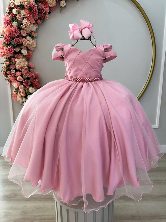 Vestido infantil rosa con busto acanalado y cinturón de perlas