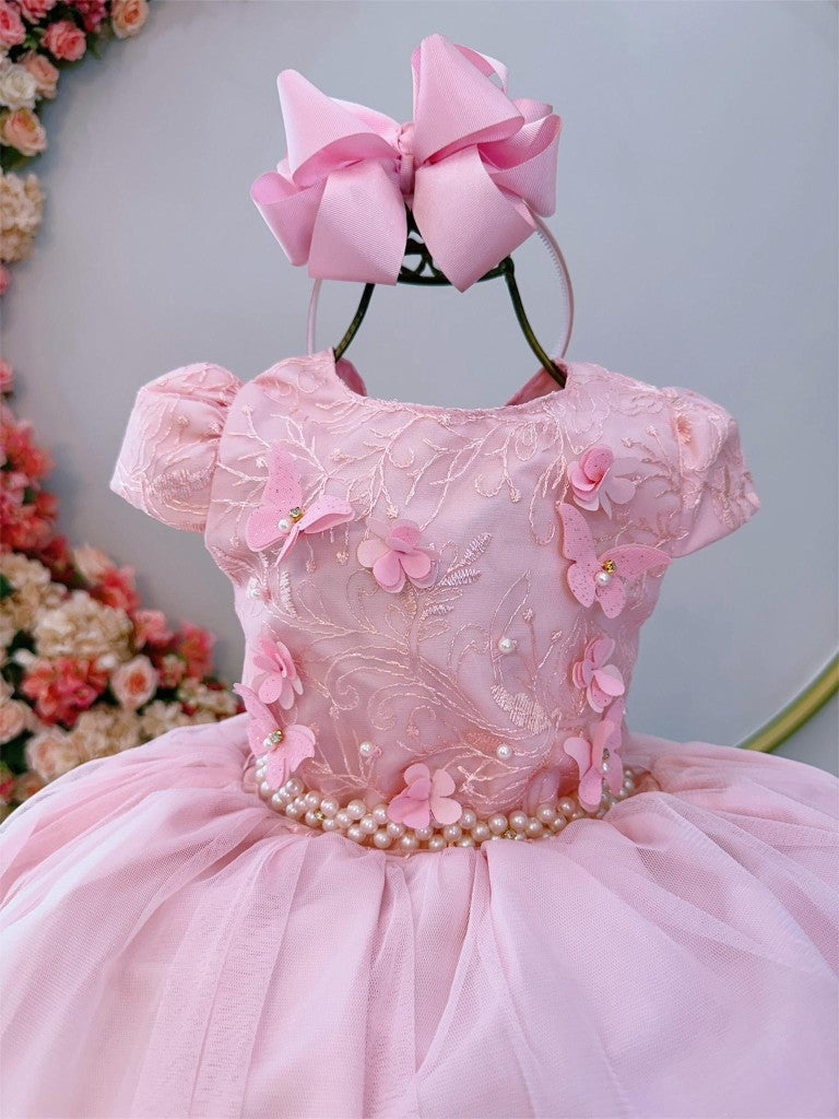 Vestido infantil rosa con encaje y aplique de mariposa
